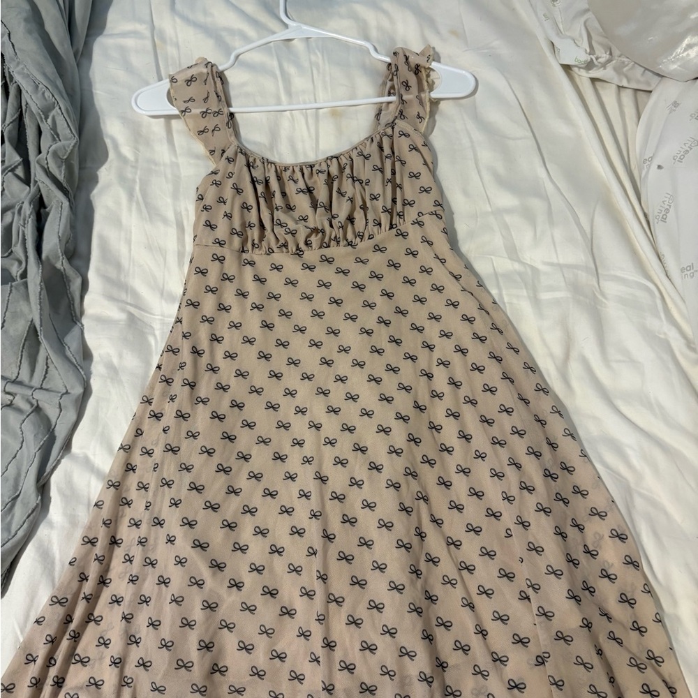 Beige Dress with Black Bow Pattern